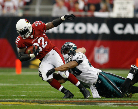 Edgerrin-james-of-the-cardinals-is-tackled-by-eagles-safety-brian-dawkins2_medium